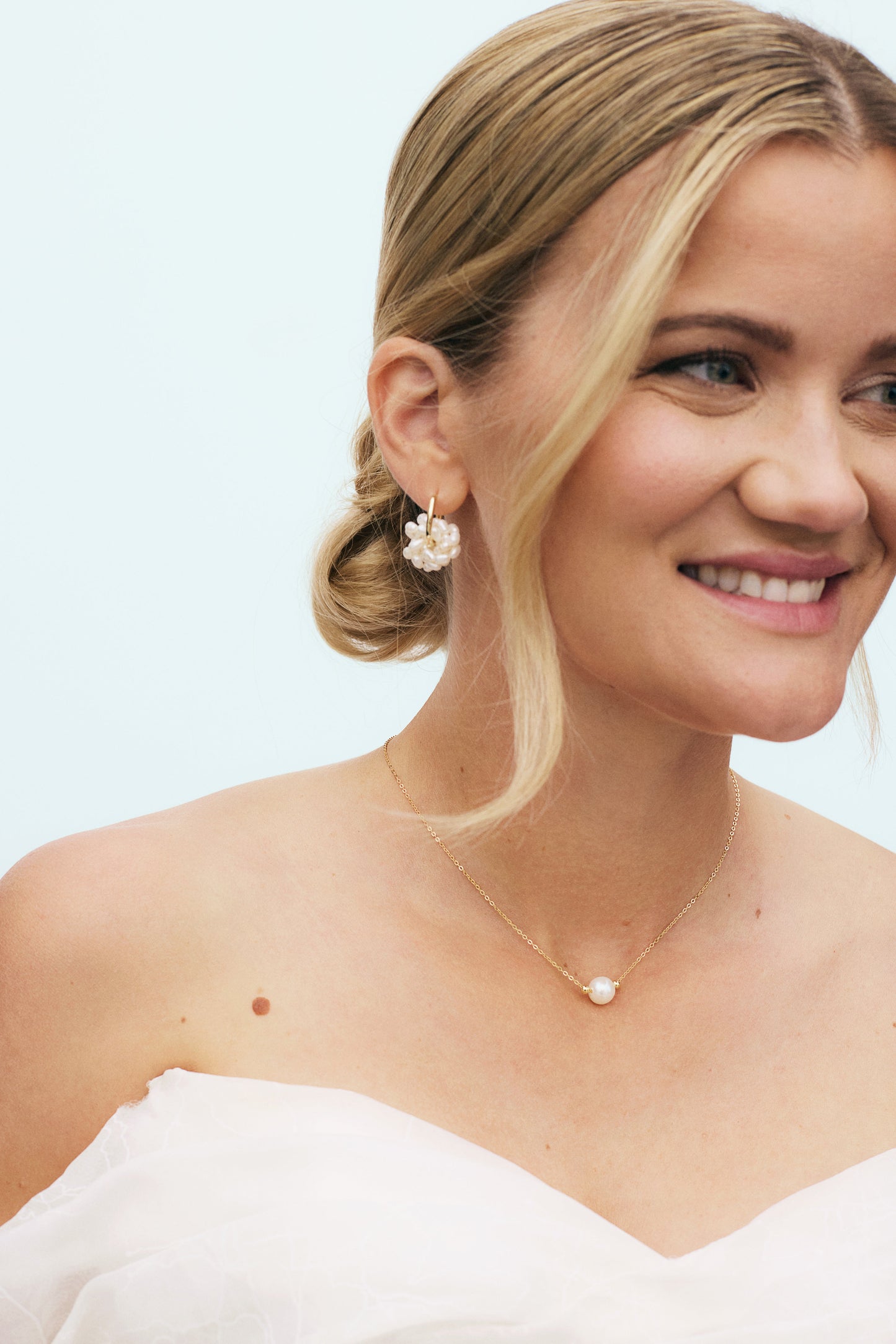 Förgyllda silversmycken med pärla